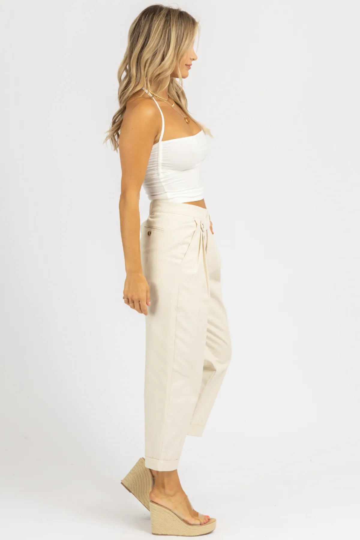 CREAM WOVEN ASYMMETRICAL BUTTON PANTS