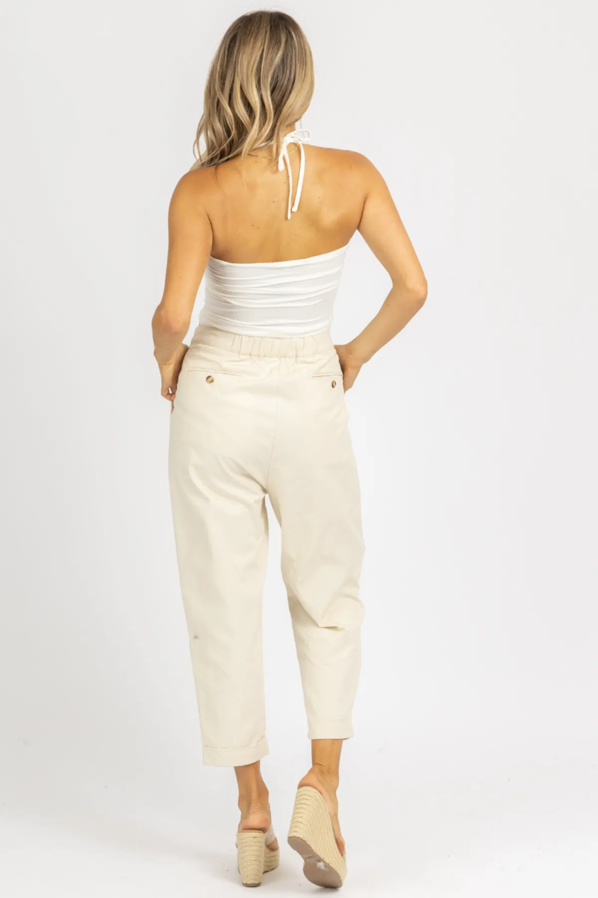 CREAM WOVEN ASYMMETRICAL BUTTON PANTS