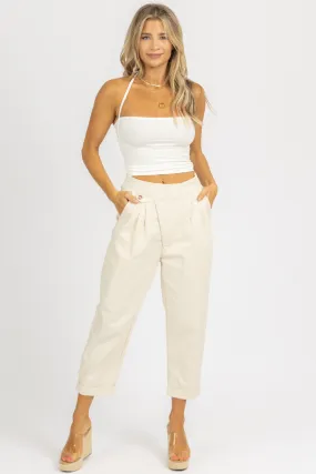 CREAM WOVEN ASYMMETRICAL BUTTON PANTS