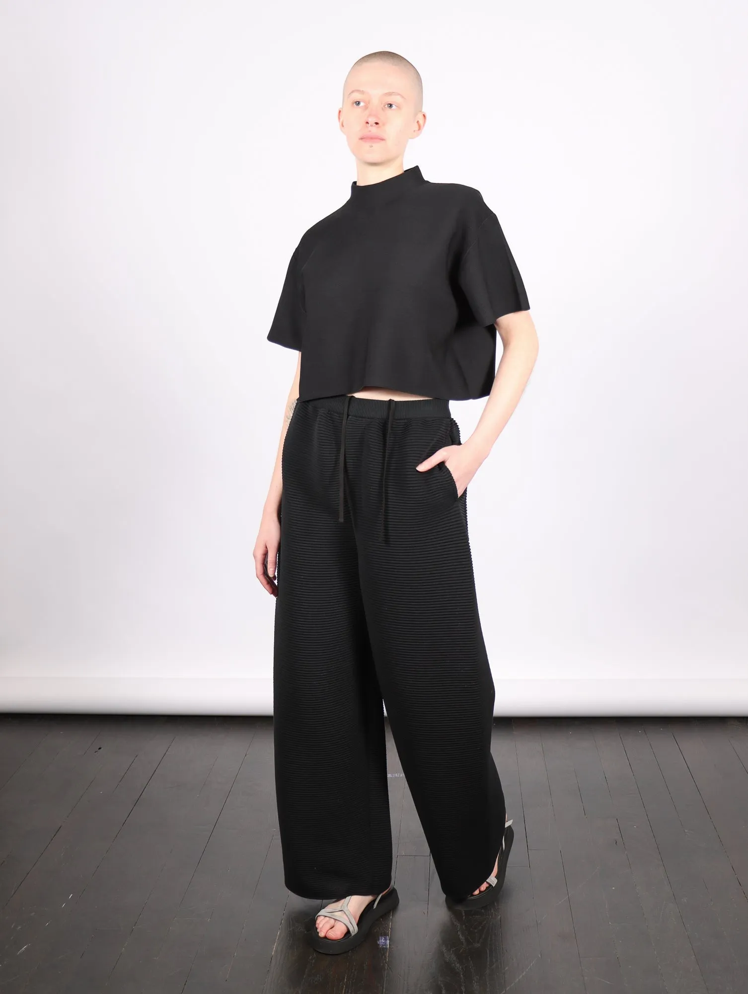 Stratum Wide Straight Pants in Black by CFCL